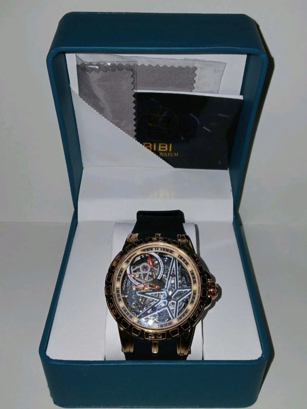 BiBi Rose Gold Skeleton Mechanical Watch with Black Strap and Red Accents